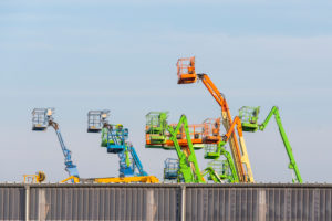 Germany, Saxony-Anhalt, Magdeburg, trading port, working platforms and telescopic forklifts. Germany, Saxony-Anhalt, Magdeburg, trading port, working platforms and telescopic forklifts.